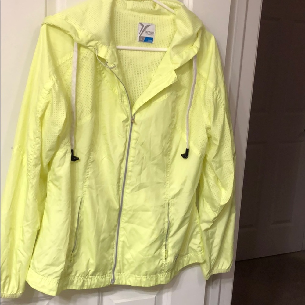 Yellow wind breaker.